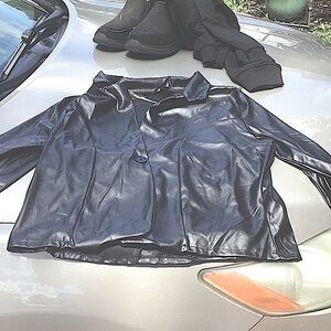 It’s lovely, one button, black leather dress jacket